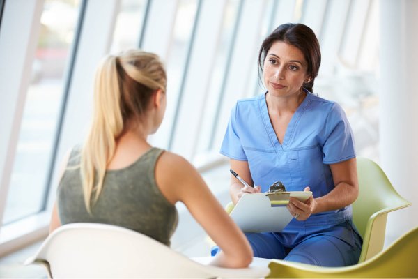 mental health technician with patient