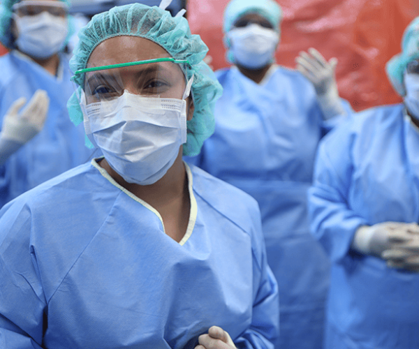 Surgical Technicians Wearing Scrubs and Masks